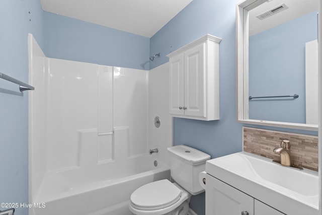 full bathroom featuring tasteful backsplash, toilet, shower / washtub combination, vanity, and visible vents