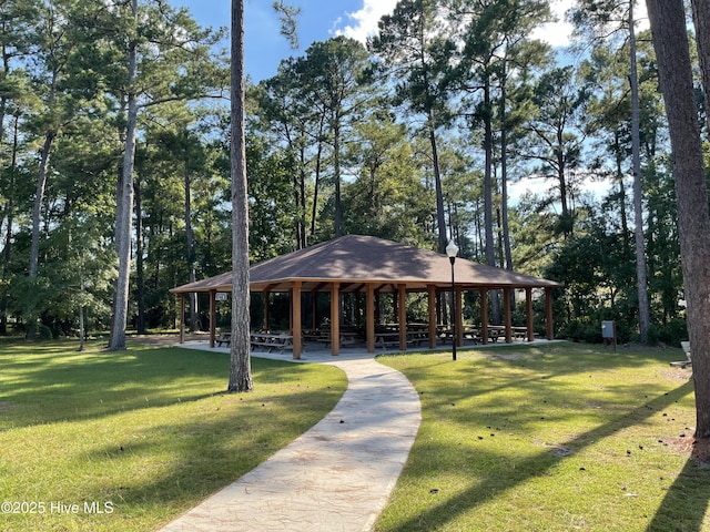 view of community featuring a gazebo and a lawn