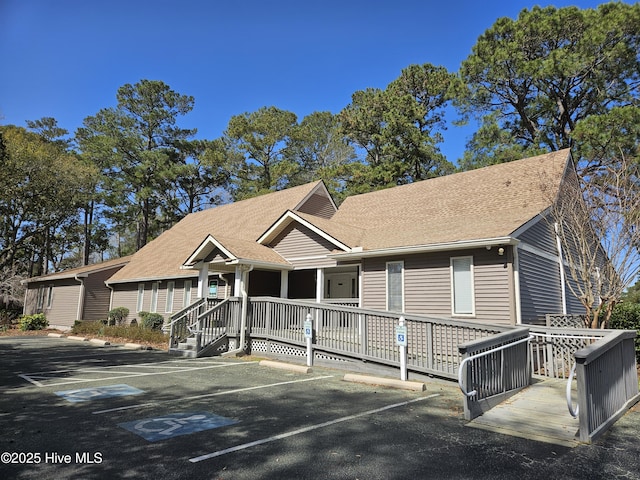 view of front of property with uncovered parking