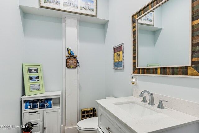 117 NW 2nd St, Oak Island, NC 28465 - half bath featuring vanity and toilet