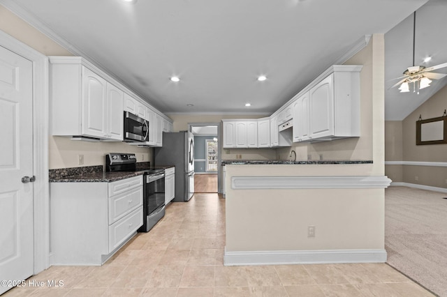 kitchen featuring ceiling fan, appliances with stainless steel finishes, white cabinets, a peninsula, and recessed lighting