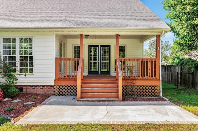 deck featuring fence and a porch