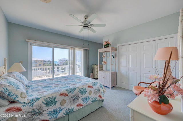 bedroom with access to outside, ceiling fan, light carpet, and a closet