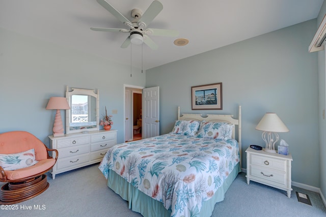 bedroom with visible vents, ceiling fan, and light colored carpet