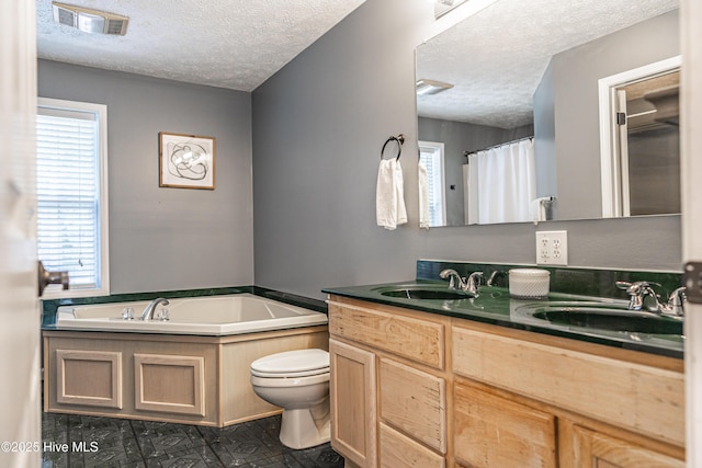 4915 Beulah Hill Church Rd, West End, NC 27376 - bathroom featuring a textured ceiling, toilet, double vanity, a garden tub, and a shower with shower curtain