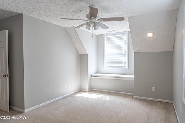 4915 Beulah Hill Church Rd, West End, NC 27376 - bonus room featuring a textured ceiling, carpet flooring, ceiling fan, baseboards, and vaulted ceiling
