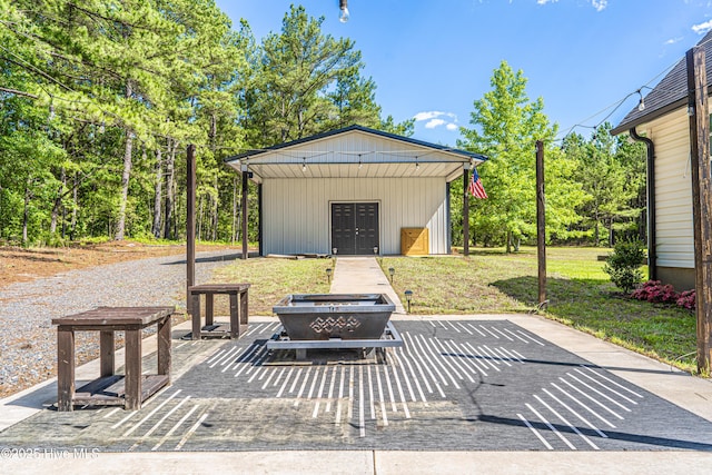 4915 Beulah Hill Church Rd, West End, NC 27376 - view of patio / terrace featuring a fire pit