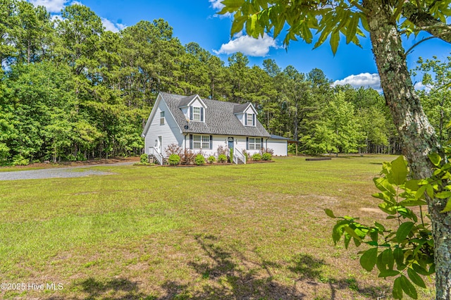 4915 Beulah Hill Church Rd, West End, NC 27376 - cape cod house featuring a front lawn and a view of trees