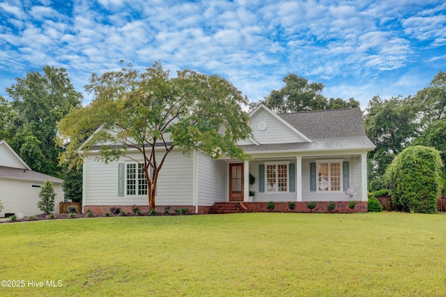 226 Bayfield Dr, Wilmington, NC 28411 - view of front of property with a front lawn and a shingled roof