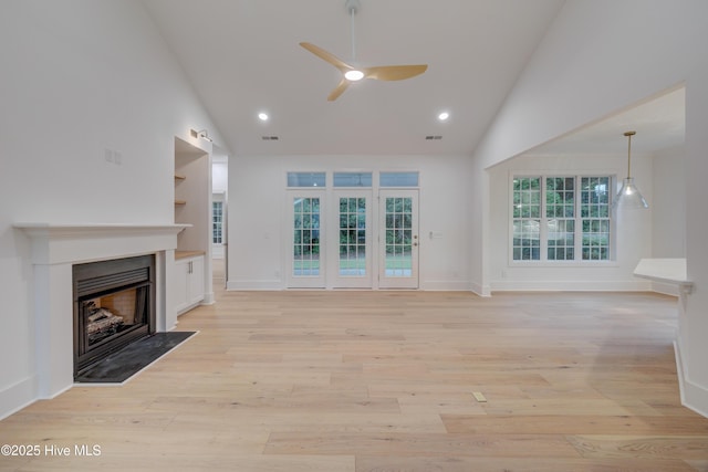 226 Bayfield Dr, Wilmington, NC 28411 - unfurnished living room with a ceiling fan, high vaulted ceiling, a fireplace, light wood finished floors, and recessed lighting