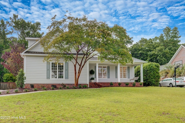 226 Bayfield Dr, Wilmington, NC 28411 - view of front of house with a front lawn and covered porch