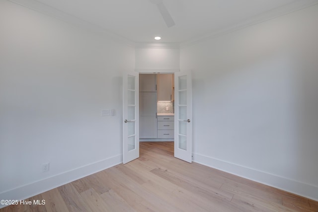 226 Bayfield Dr, Wilmington, NC 28411 - spare room featuring french doors, ornamental molding, light wood-style flooring, ceiling fan, and recessed lighting