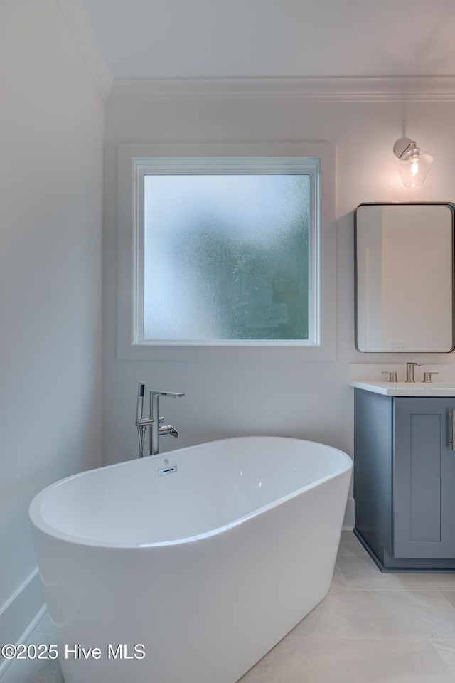 226 Bayfield Dr, Wilmington, NC 28411 - full bath with crown molding, vanity, and a soaking tub