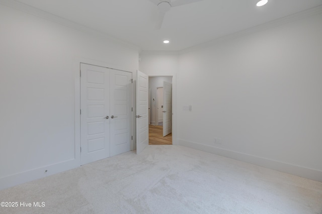 226 Bayfield Dr, Wilmington, NC 28411 - unfurnished bedroom with crown molding, carpet floors, recessed lighting, and a closet