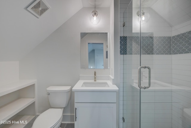 226 Bayfield Dr, Wilmington, NC 28411 - bathroom featuring lofted ceiling, vanity, and a stall shower