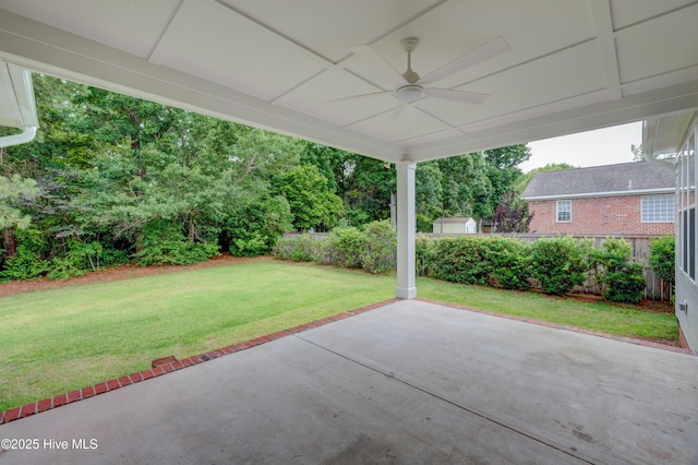 226 Bayfield Dr, Wilmington, NC 28411 - fenced backyard with a ceiling fan and a patio area