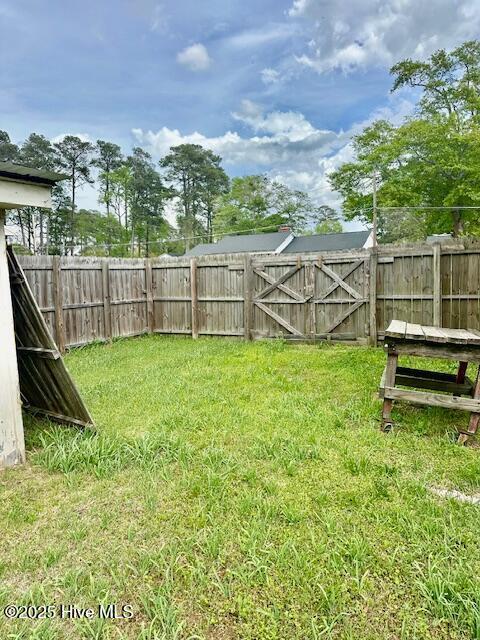 view of yard featuring fence