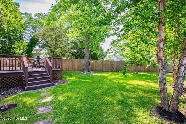 411 Queen St, New Bern, NC 28560 - view of yard featuring a fenced backyard and a wooden deck