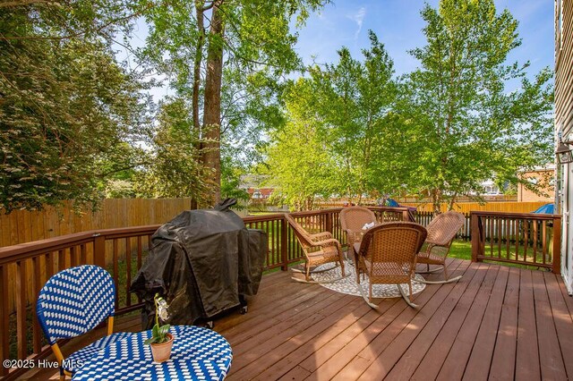 411 Queen St, New Bern, NC 28560 - deck with outdoor dining area and a fenced backyard