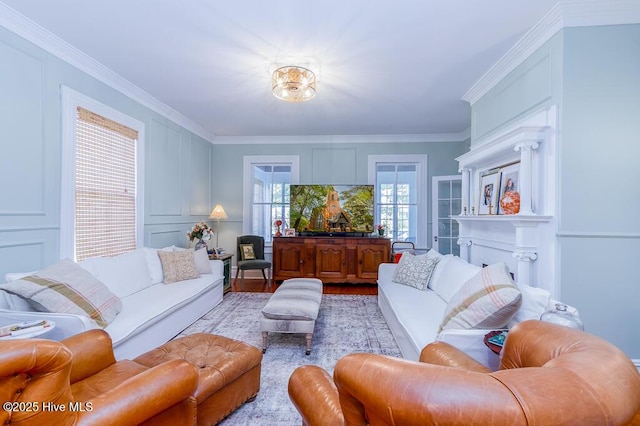411 Queen St, New Bern, NC 28560 - living area featuring crown molding and light wood-style flooring