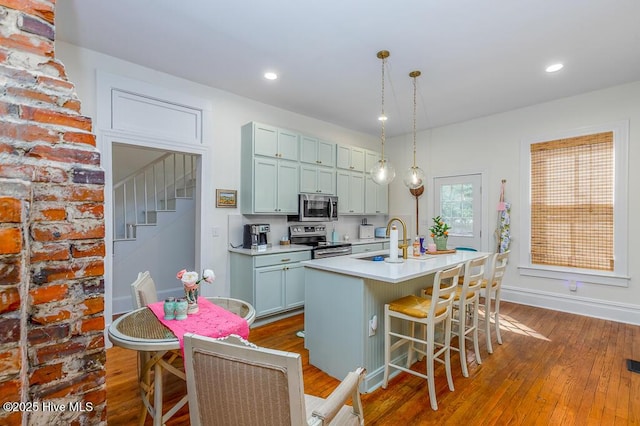 411 Queen St, New Bern, NC 28560 - kitchen featuring a sink, appliances with stainless steel finishes, and dark wood finished floors
