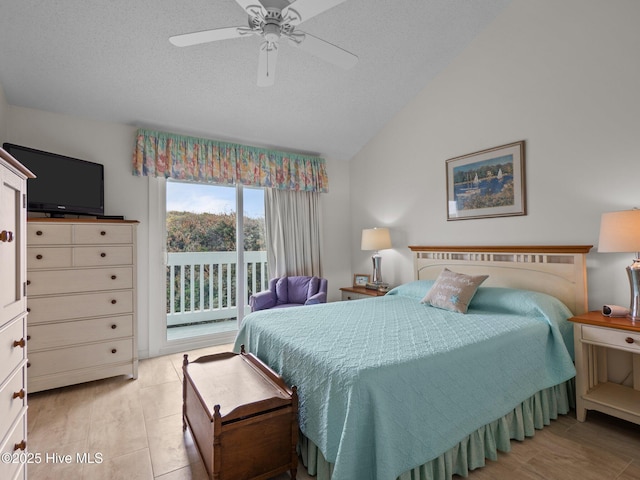 bedroom featuring a textured ceiling, ceiling fan, access to outside, and vaulted ceiling