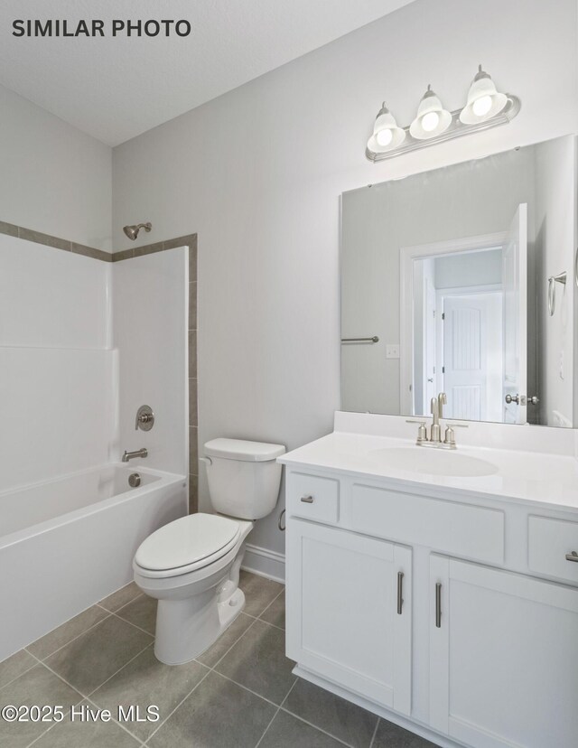 608 Indigo Johnston Dr, Jacksonville, NC 28546 - full bathroom featuring toilet, tile patterned floors, vanity, and shower / bath combination
