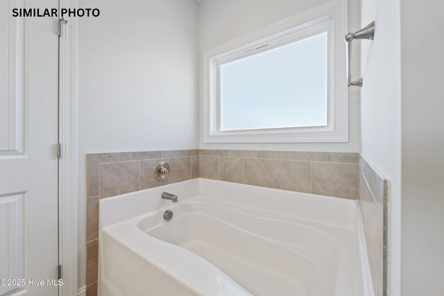 608 Indigo Johnston Dr, Jacksonville, NC 28546 - bathroom with a garden tub