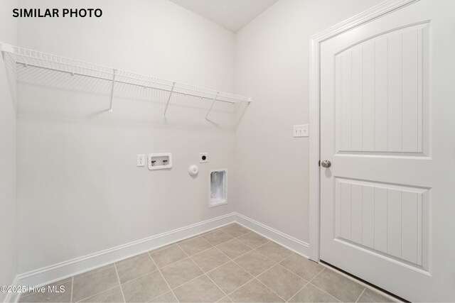 608 Indigo Johnston Dr, Jacksonville, NC 28546 - washroom with baseboards, laundry area, gas dryer hookup, hookup for an electric dryer, and hookup for a washing machine