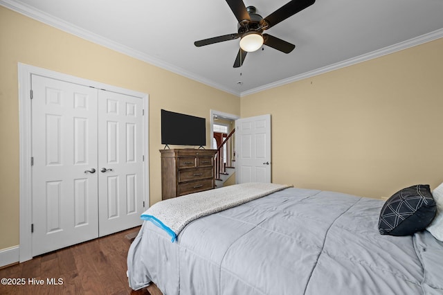 281 Whichard Ln, Chocowinity, NC 27817 - bedroom with ornamental molding, dark wood-style flooring, a closet, and a ceiling fan