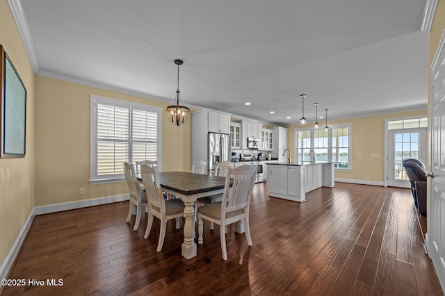 281 Whichard Ln, Chocowinity, NC 27817 - dining room featuring baseboards, crown molding, dark wood-type flooring, a chandelier, and recessed lighting