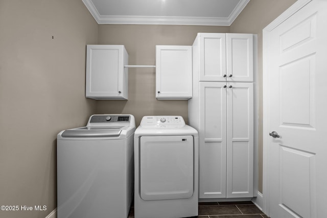281 Whichard Ln, Chocowinity, NC 27817 - laundry area with cabinet space, washer and clothes dryer, crown molding, and dark tile patterned floors