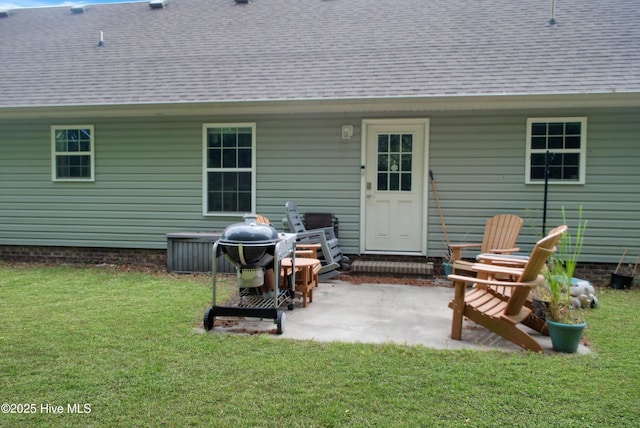 314 Nugget Trl, Elizabeth City, NC 27909 - rear view of house with a lawn, a patio area, and roof with shingles