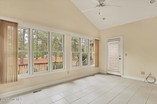 17 Windsong Pl, Whispering Pines, NC 28327 - unfurnished sunroom with tile patterned floors and high vaulted ceiling