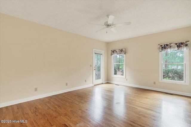 17 Windsong Pl, Whispering Pines, NC 28327 - empty room featuring a ceiling fan and wood finished floors