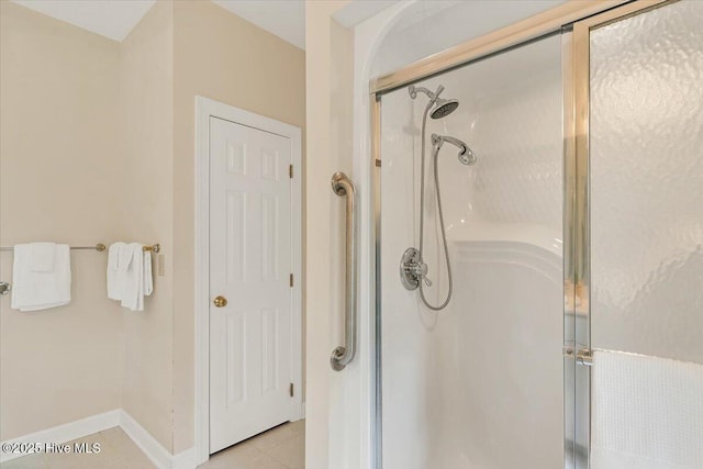 17 Windsong Pl, Whispering Pines, NC 28327 - bathroom featuring a stall shower and tile patterned flooring