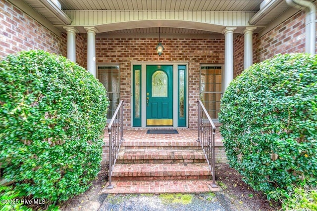17 Windsong Pl, Whispering Pines, NC 28327 - entrance to property featuring brick siding and covered porch