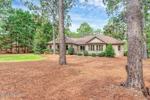 17 Windsong Pl, Whispering Pines, NC 28327 - ranch-style house with brick siding