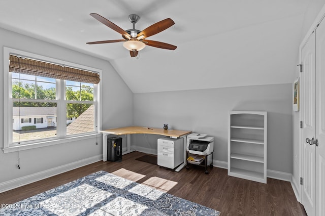 office area featuring lofted ceiling, baseboards, dark wood-style flooring, and a ceiling fan