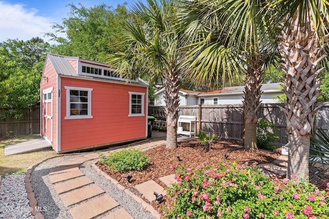 view of shed featuring a fenced backyard