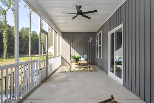 6445 Red Oak Rd, Battleboro, NC 27809 - unfurnished sunroom with ceiling fan