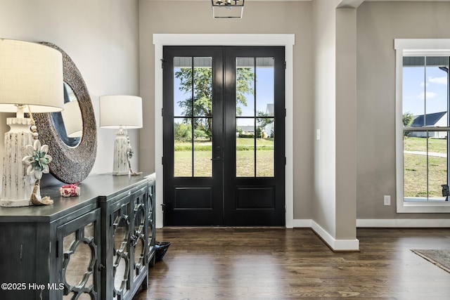 6445 Red Oak Rd, Battleboro, NC 27809 - foyer entrance featuring french doors, wood finished floors, and healthy amount of natural light