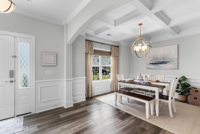 57 N Passerine Path, Hampstead, NC 28443 - dining space with wood finished floors, arched walkways, a chandelier, beamed ceiling, and crown molding