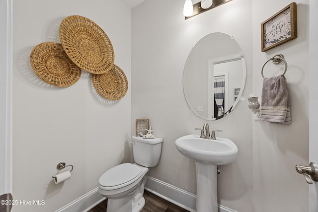 57 N Passerine Path, Hampstead, NC 28443 - half bathroom with baseboards and wood finished floors