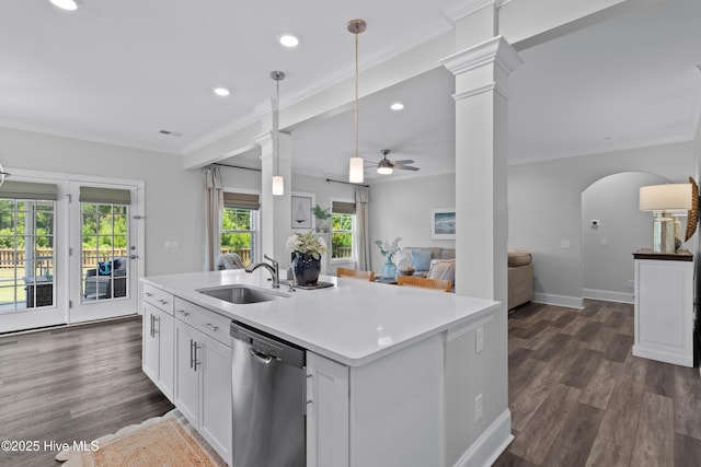 57 N Passerine Path, Hampstead, NC 28443 - kitchen with dishwasher, ceiling fan, open floor plan, decorative columns, and white cabinetry