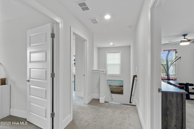 57 N Passerine Path, Hampstead, NC 28443 - corridor featuring carpet floors, an upstairs landing, plenty of natural light, and recessed lighting