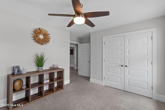 57 N Passerine Path, Hampstead, NC 28443 - carpeted bedroom with a closet and a ceiling fan