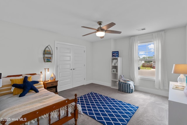 57 N Passerine Path, Hampstead, NC 28443 - carpeted bedroom featuring ceiling fan and a closet