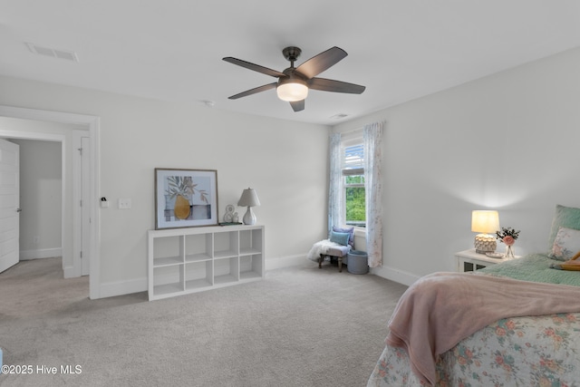 57 N Passerine Path, Hampstead, NC 28443 - carpeted bedroom with baseboards and ceiling fan