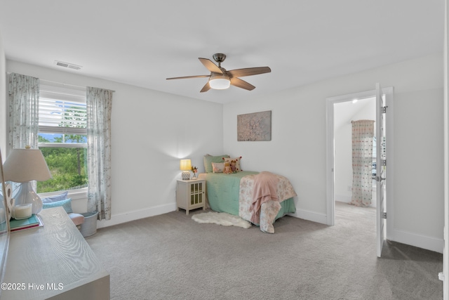 57 N Passerine Path, Hampstead, NC 28443 - bedroom with carpet and a ceiling fan